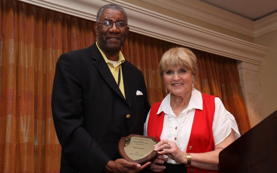 Wendell Griffen presenting Babs Baugh the Baptist of the Year Award