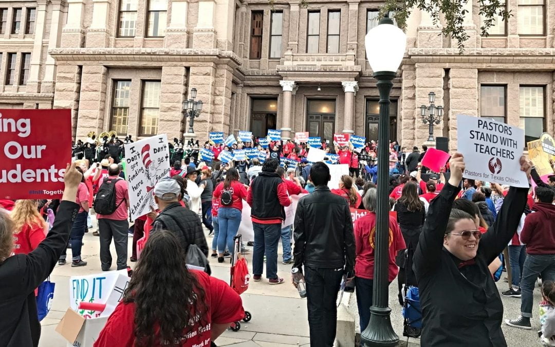 People outside the Texas Capitol building for a public education rally