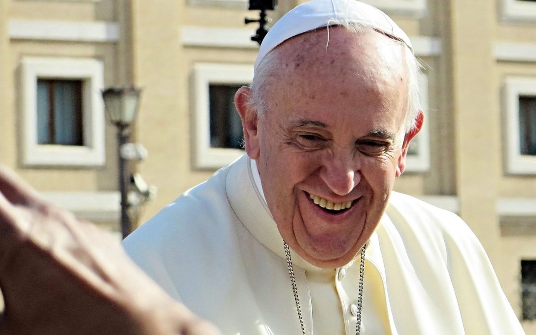 Pope Francis, outside and smiling